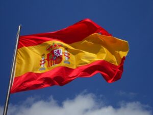 Studying in Spain information, spain flag with blue background